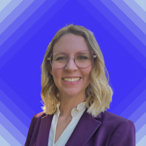 Katie West_headshot_blue_4.11.25 (1)